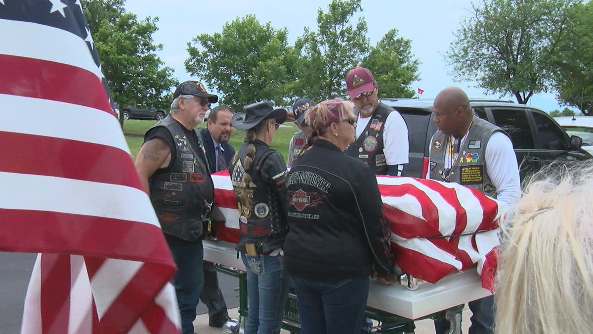 After receiving a burial request for two unclaimed veterans, officials at the cemetery gathered...