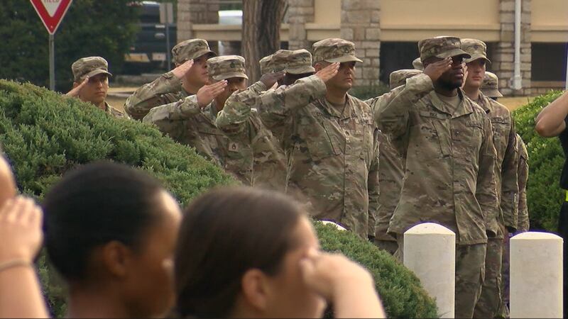 Soldiers saluting during the Fort Sill 9/11 Memorial Run ceremony.