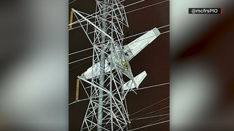 A small plane got tangled in power lines after a crash in Montgomery Village, Maryland Sunday...