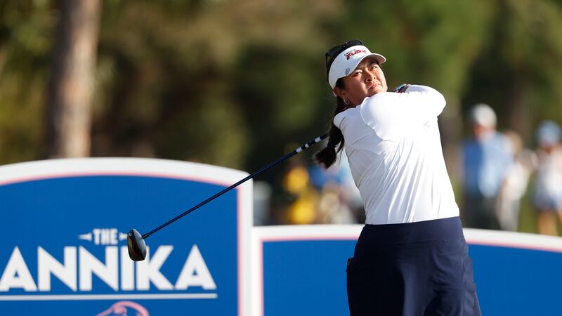 Lilia Vu watches her tee shot on the 18th hole during the final round of an LPGA golf...