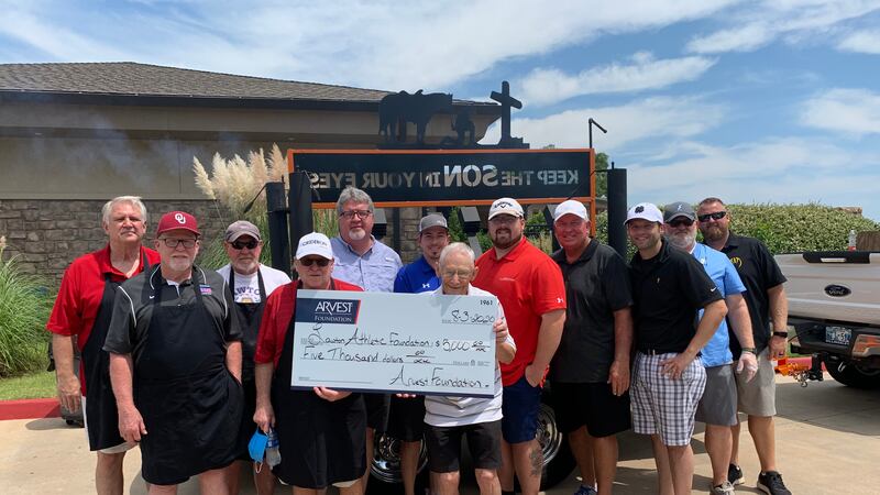 The Arvest Foundation delivered a check for $5,000 to the Lawton Athletic Foundation during...